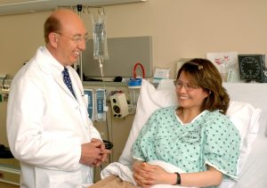 woman sitting with her doctor